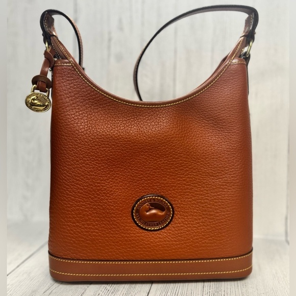 Dooney & Bourke Handbags - Vintage Dooney & Bourke 1980’s “British Tan”
 All Weather leather Small Hobo Bag